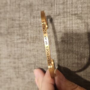 Superheros wear scrubs bracelet